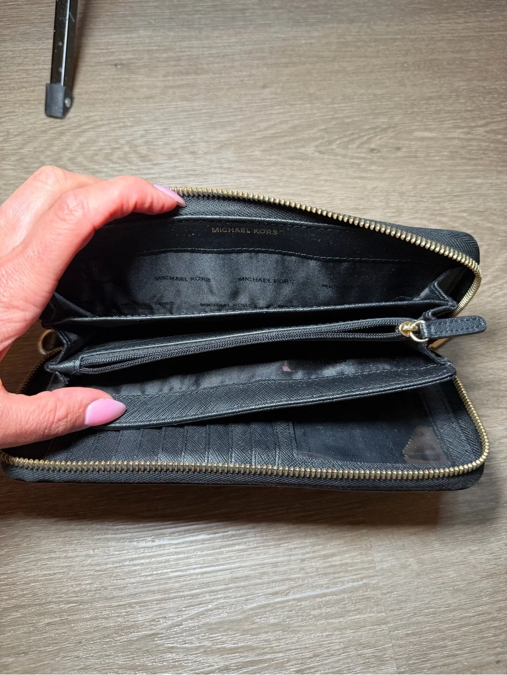 Michael Kors Black Zip-Around Saffiano Wallet with Gold Logo